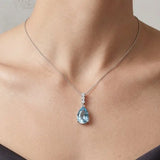 18ct White Gold Natural Diamond And Blue Topaz Pendant