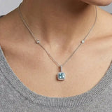 18ct White Gold Natural Diamond And Blue Topaz Pendant