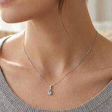 18ct White Gold Natural Diamond And Blue Topaz Pendant