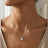 18ct White Gold Natural Diamond And Blue Topaz Pendant