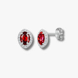 18ct White gold Natural Diamond 15pt and garnet 1.46ct stud earrings.