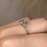 "Arianna" Oval Cut Diamond Shoulders Engagement Ring Life Style- Side View