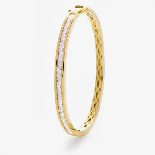 BAGUETTE CUT DIAMOND CHANNEL HALF SET BANGLE IN 18K YELLOW GOLD HEERA DIAMONDS