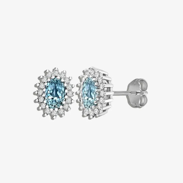 BLUE TOPAZ HALO STUD EARRINGS IN 9K WHITE GOLD HEERA DIAMONDS