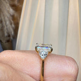 "Brenzy" Emerald Cut 2.5 Carat Three Stone Trilogy Engagement Ring life style-Side view