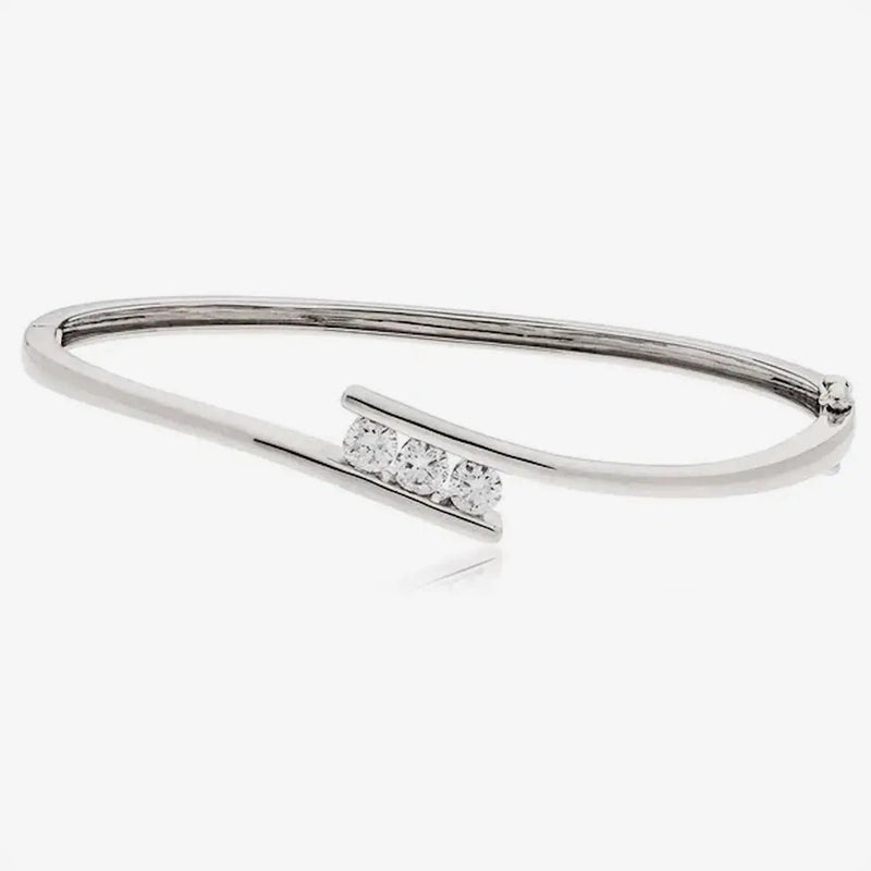 DIAMOND THREE-STONE CROSS OVER BANGLE IN 18K WHITE GOLD HEERA DIAMONDS