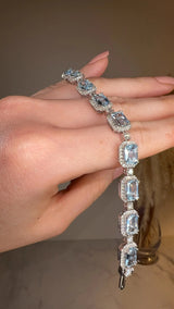 Emerald Shape 11 Carat Aquamarine Tennis Bracelet Featuring Diamond Halo BRHAEC HEERA DIAMONDS