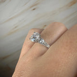 "Kayle" Round Cut 1.5 Carat Trilogy Platinum Engagement Ring Life style- Top View