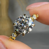 "Oryxen" 1.5 Carat Round Cut Lab Grown Diamond Shoulder Engagement Ring HLR539