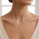 Oval Ruby with Diamond Halo Pendant