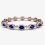 Oval Shape 9 Carat Sapphire Center Featuring Diamond Halo Bracelet BRHAOCS HEERA DIAMONDS