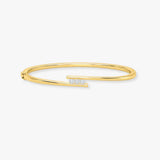 ROUND DIAMOND 0.36 CARAT THREE STONE CROSS OVER BANGLE