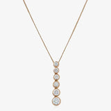 Round cut solitaire diamonds in rub over setting HEERA DIAMONDS