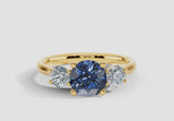 "Bluzz" Round Cut 1.5 Carat Blue Sapphire Trilogy Yellow Gold Engagement Ring 3SRB51