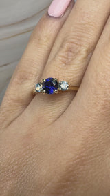 "Bluzz" Round Cut 1.5 Carat Blue Sapphire Trilogy Yellow Gold Engagement Ring 3SRB51