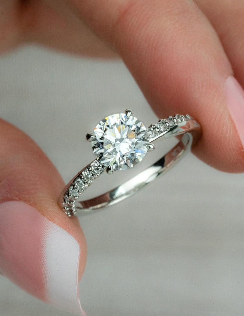 OBELISK -Round Brilliant Engagement Ring with Diamond Shoulders in Platinum - HEERA DIAMONDS