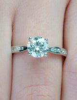 REBECA - Round Brilliant Engagement ring with Diamond Shoulders in Yellow Gold - HEERA DIAMONDS