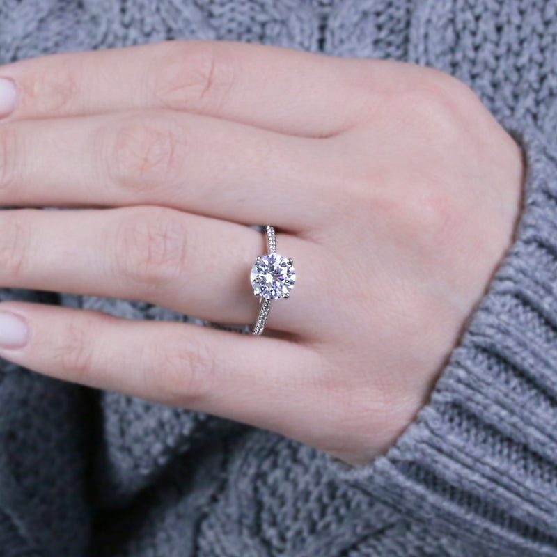 Eleanor-Round-brilliant-engagement-ring-with-grain-setting-diamond-shoulders-in-platinum - HEERA DIAMONDS