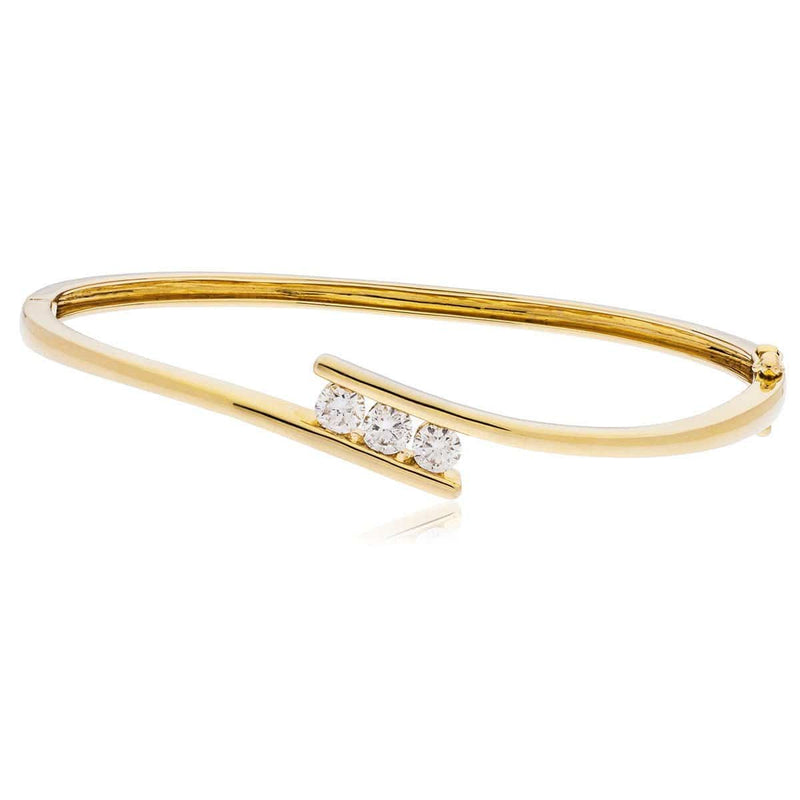 DIAMOND THREE STONE CROSS OVER BANGLE IN 9K YELLOW GOLD - HEERA DIAMONDS