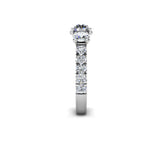 VERDUM - Round Brilliant Trilogy Engagement Ring with Diamond Shoulders in Platinum - HEERA DIAMONDS
